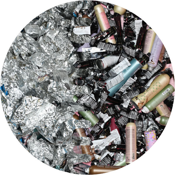 A pile of aluminum foil with a lot of cosmetics in it. We recycle it all